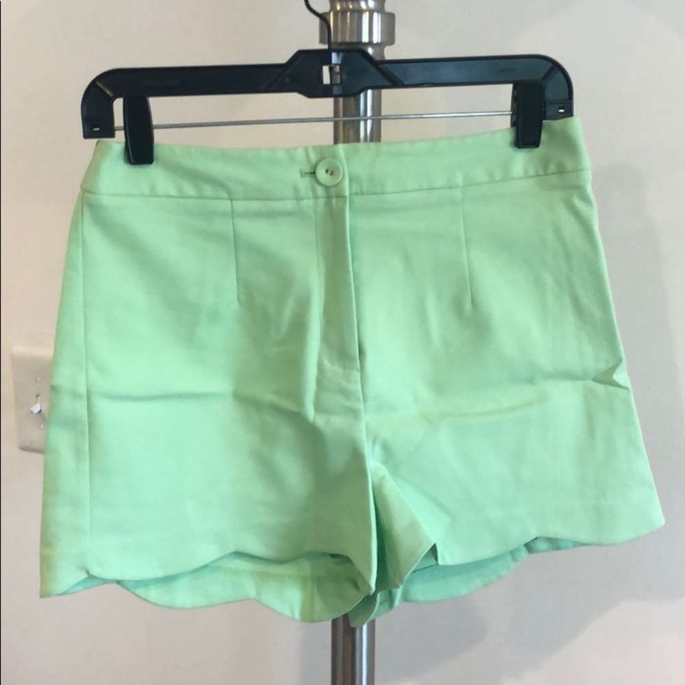 Light green scalloped shorts
